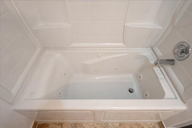 a bathroom with a bathtub