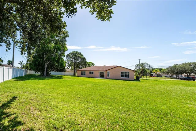 a view of a lake with a big yard