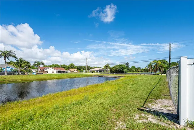 a view of a lake with a house