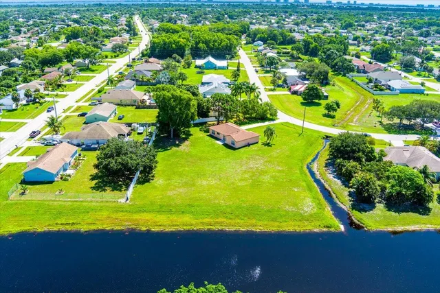 a view of an swimming pool with seating area