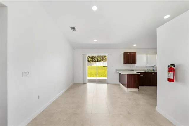 a view of room with flat screen tv