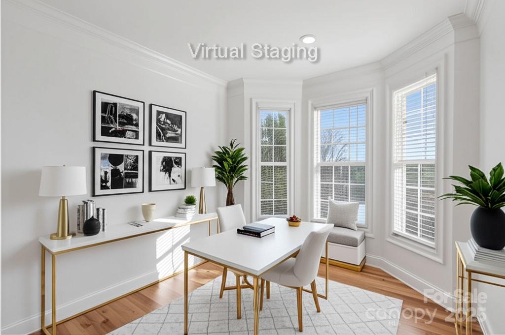 5774 Crown Terrace Hickory, NC 28601 - Photo 11 of 48 a living room with furniture a potted plant and a large window