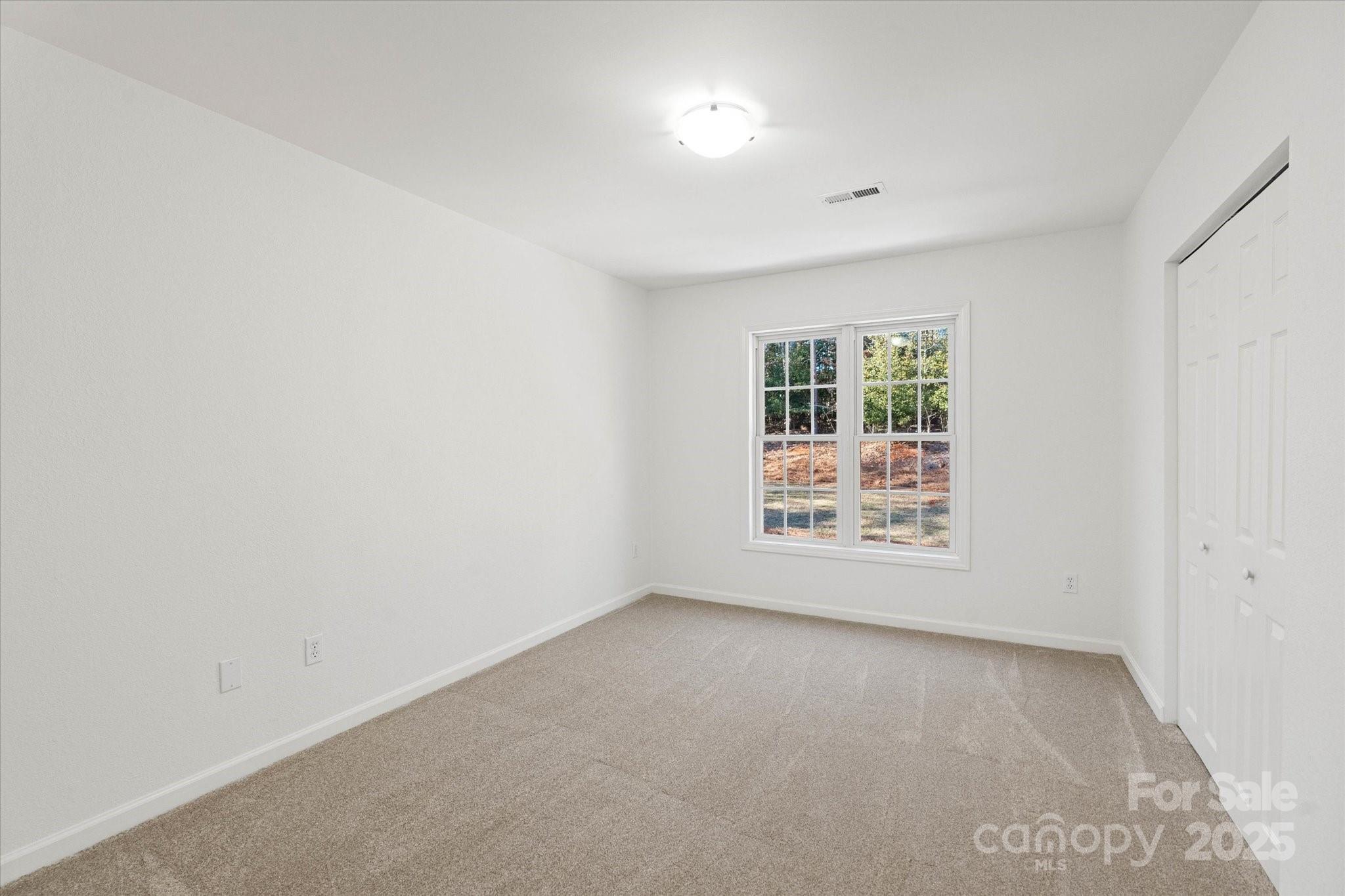 5774 Crown Terrace Hickory, NC 28601 - Photo 39 of 48 an empty room with windows