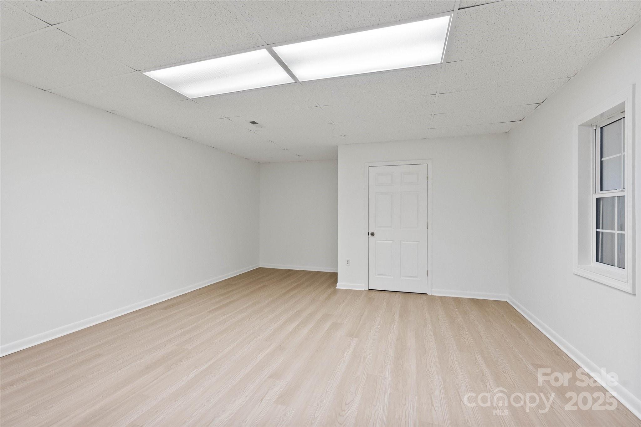 5774 Crown Terrace Hickory, NC 28601 - Photo 45 of 48 wooden floor in an empty room