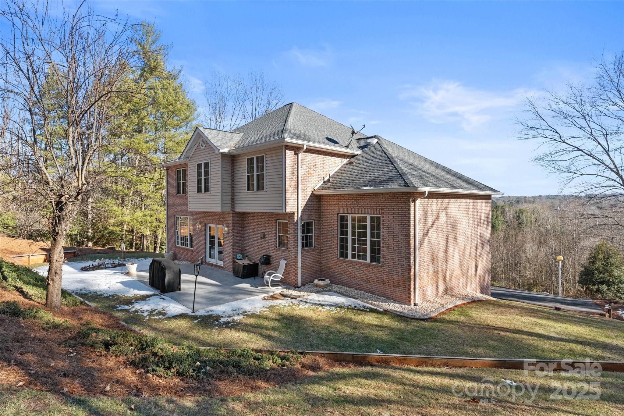 5774 Crown Terrace Hickory, NC 28601 - Photo 48 of 48 a view of a house with a yard and large tree
