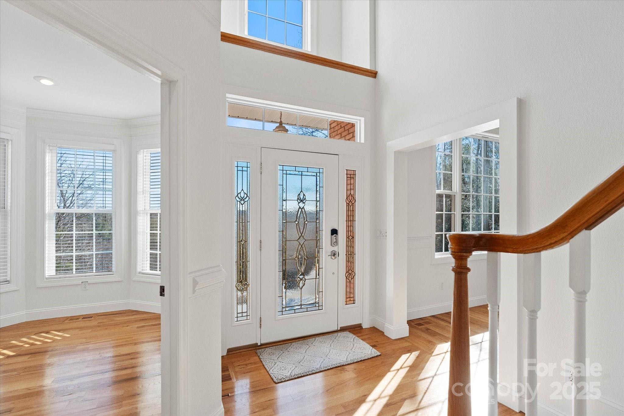 5774 Crown Terrace Hickory, NC 28601 - Photo 9 of 48 a view of an entryway with wooden floor and door