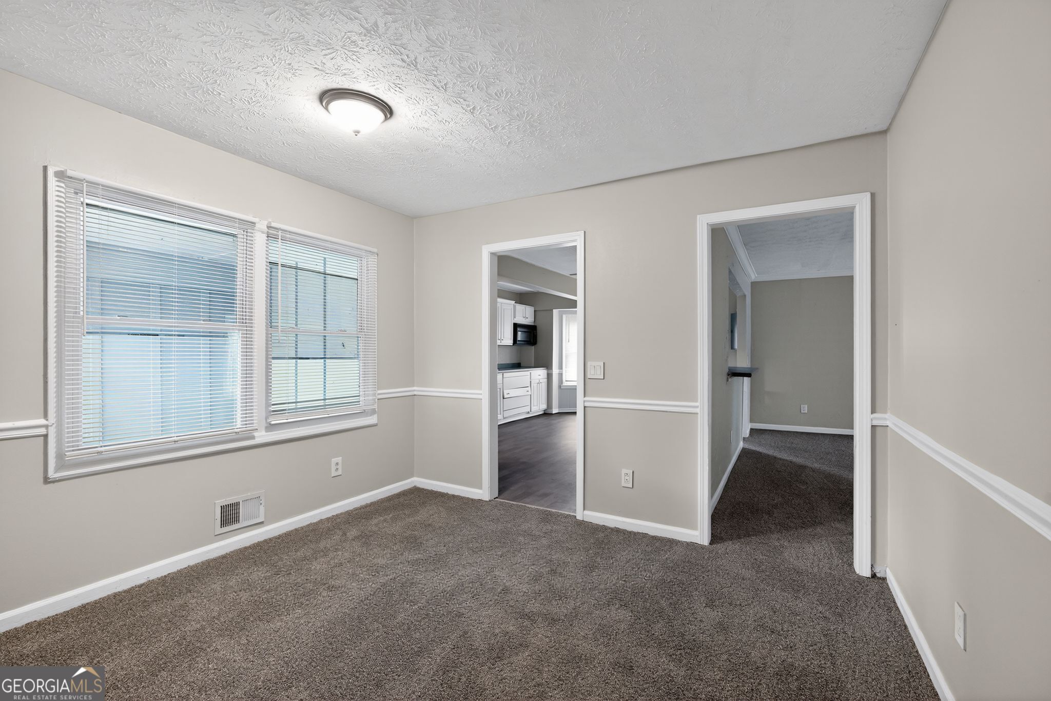 3285 Old Salem Road Southeast Conyers, GA 30013 - Photo 27 of 33 an empty room with windows and closet