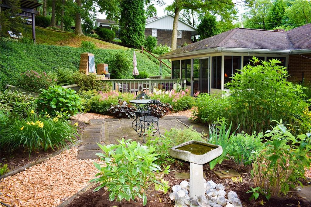 113 Morningside Drive Butler, PA 16002 - Photo 21 of 25 Tranquil gardens to delight, charming brick patio, and numerous walkways and paths throughout.