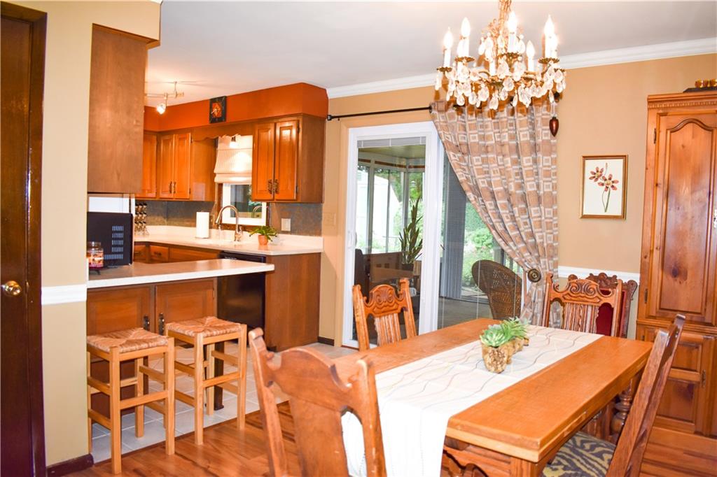 113 Morningside Drive Butler, PA 16002 - Photo 5 of 25 The dining room is conveniently located adjacent to the beautiful updated kitchen with Corian counters! All appliances are included too.