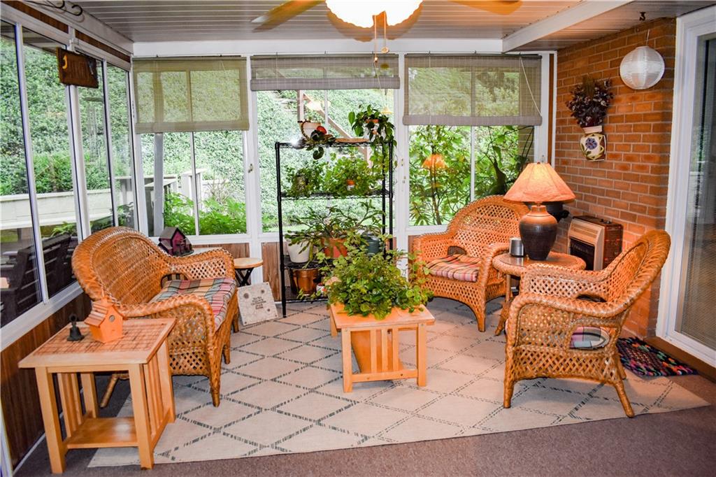 113 Morningside Drive Butler, PA 16002 - Photo 9 of 25 Sunroom with a ceiling fan and complete privacy!