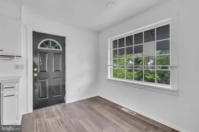 an empty room with windows