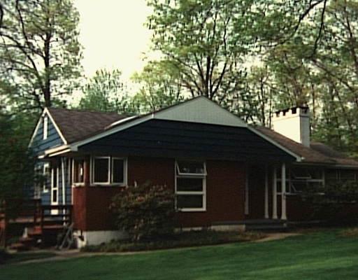 20 Olmstead Road Redding, CT 06896 - Photo 1 of 1 a front view of a house with a garden