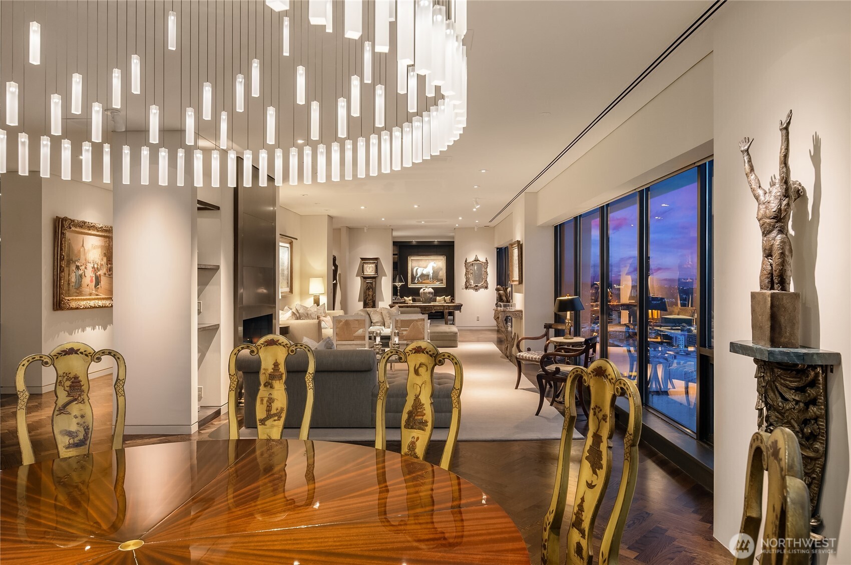 1301 Spring Street, Unit PH32 Seattle, WA 98104 - Photo 11 of 40 a view of a dining room with furniture window and wooden floor