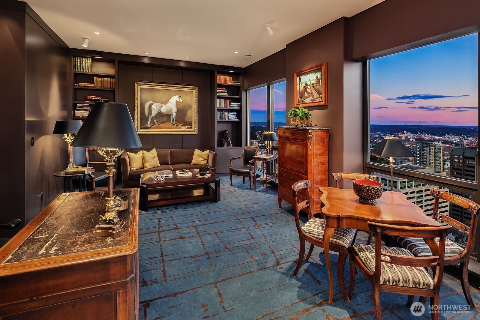 1301 Spring Street, Unit PH32 Seattle, WA 98104 - Photo 15 of 40 a outdoor living space with furniture and a flat screen tv