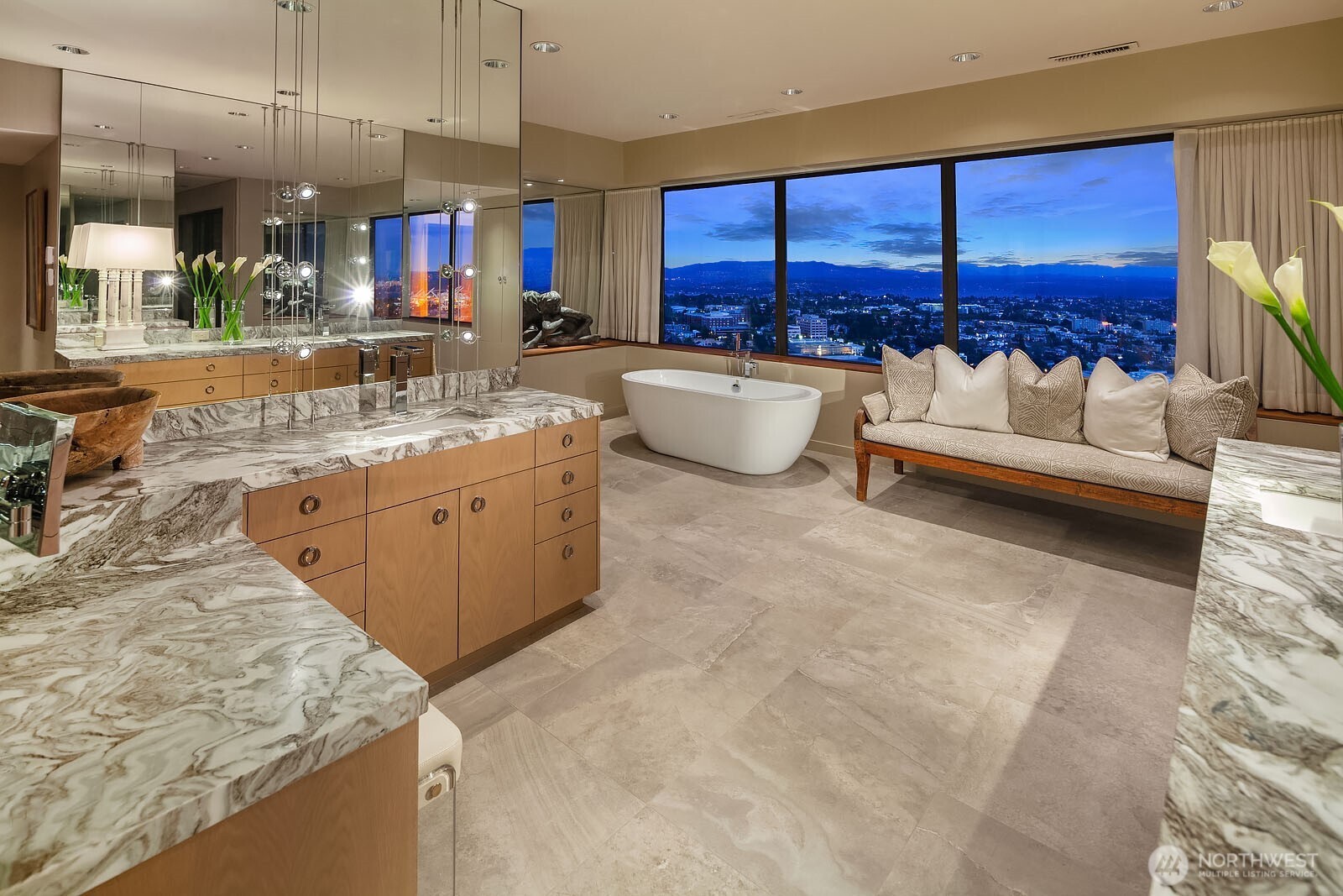 1301 Spring Street, Unit PH32 Seattle, WA 98104 - Photo 28 of 40 a kitchen with a sink stove and cabinets