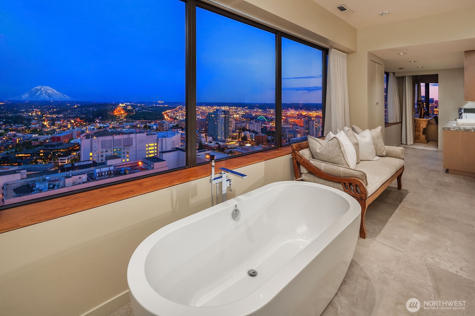 1301 Spring Street, Unit PH32 Seattle, WA 98104 - Photo 29 of 40 a bathroom with a large tub and sink