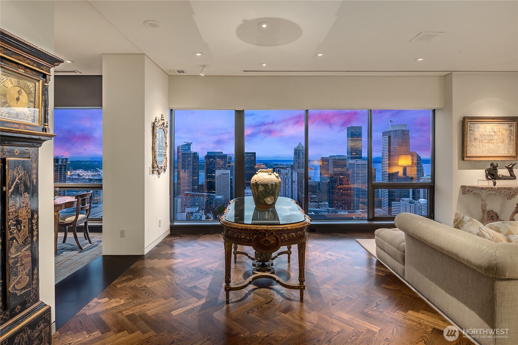 1301 Spring Street, Unit PH32 Seattle, WA 98104 - Photo 4 of 40 a work room with furniture and wooden floor