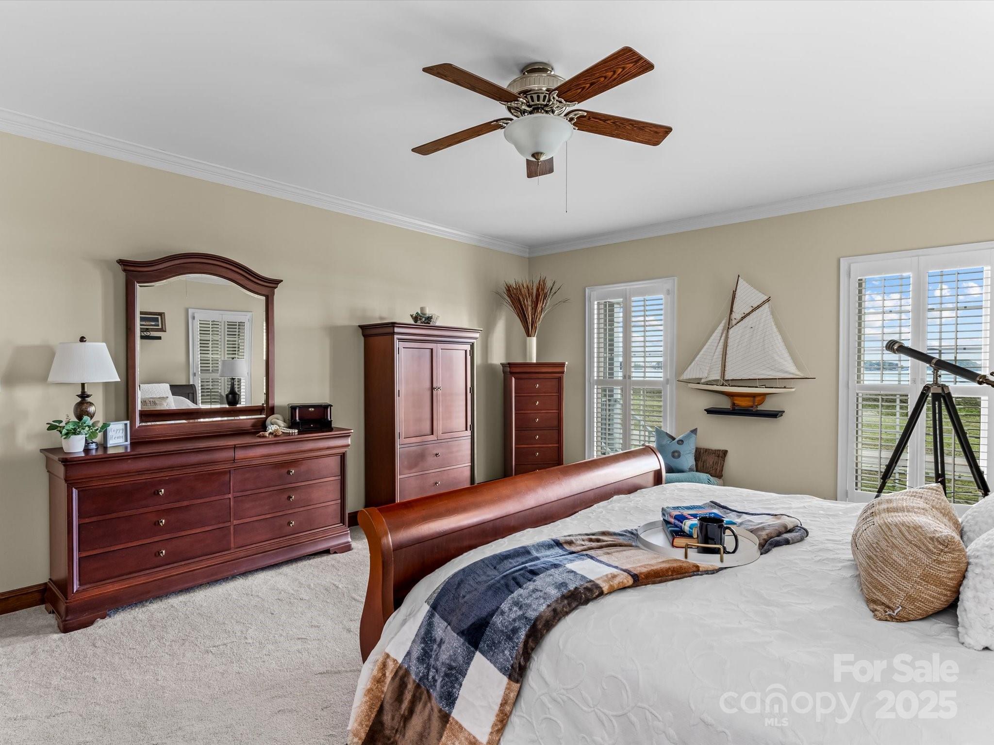 806 Lake Mist Drive Stanley, NC 28164 - Photo 27 of 47 a bedroom with a bed and a dresser