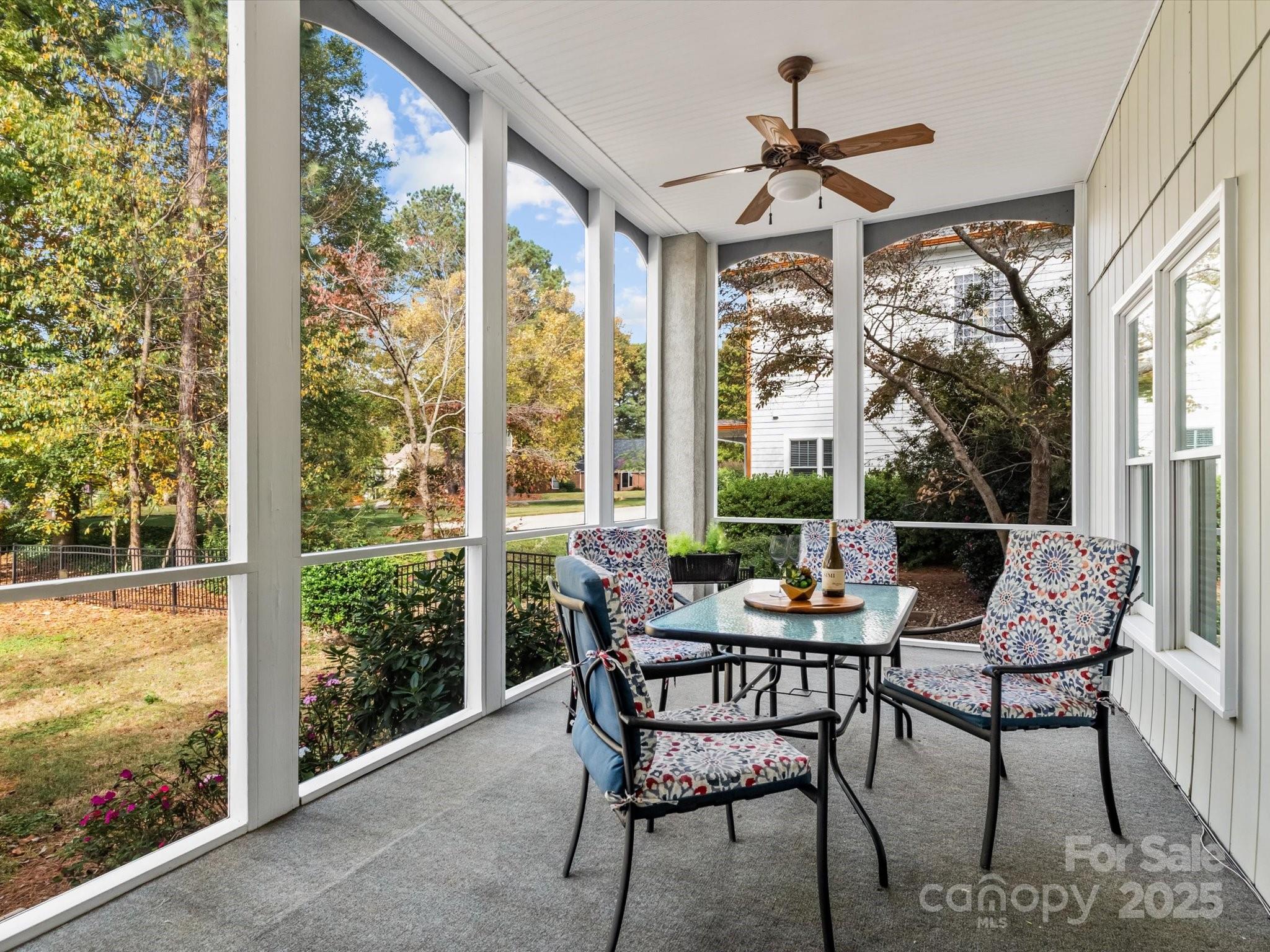806 Lake Mist Drive Stanley, NC 28164 - Photo 41 of 47 a dining room with furniture large windows and wooden floor