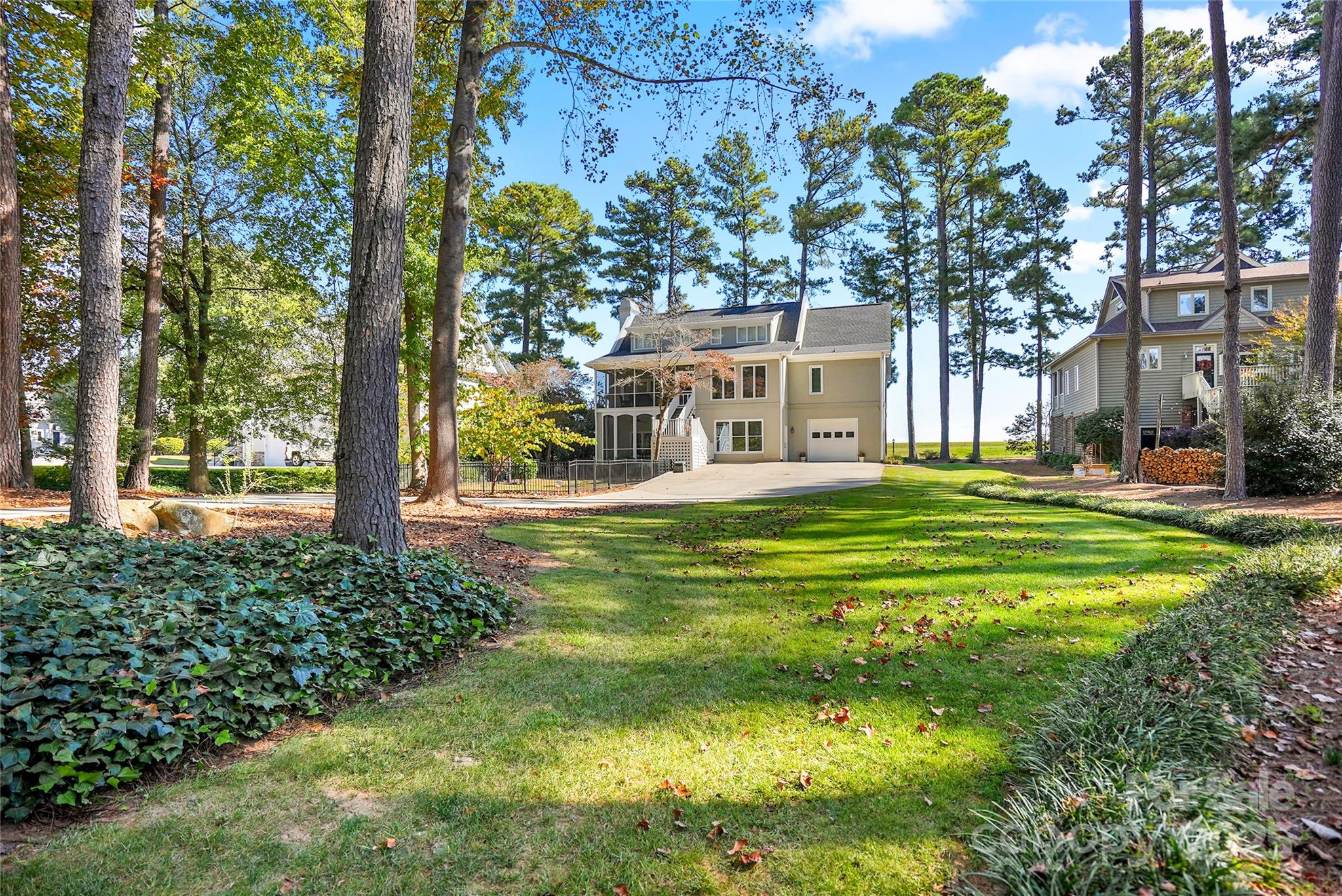 806 Lake Mist Drive Stanley, NC 28164 - Photo 6 of 47 a front view of a house with a yard table and chairs