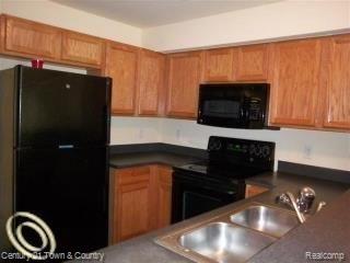 1156 Faulkner, Unit 4 Troy, MI 48083 - Photo 4 of 10