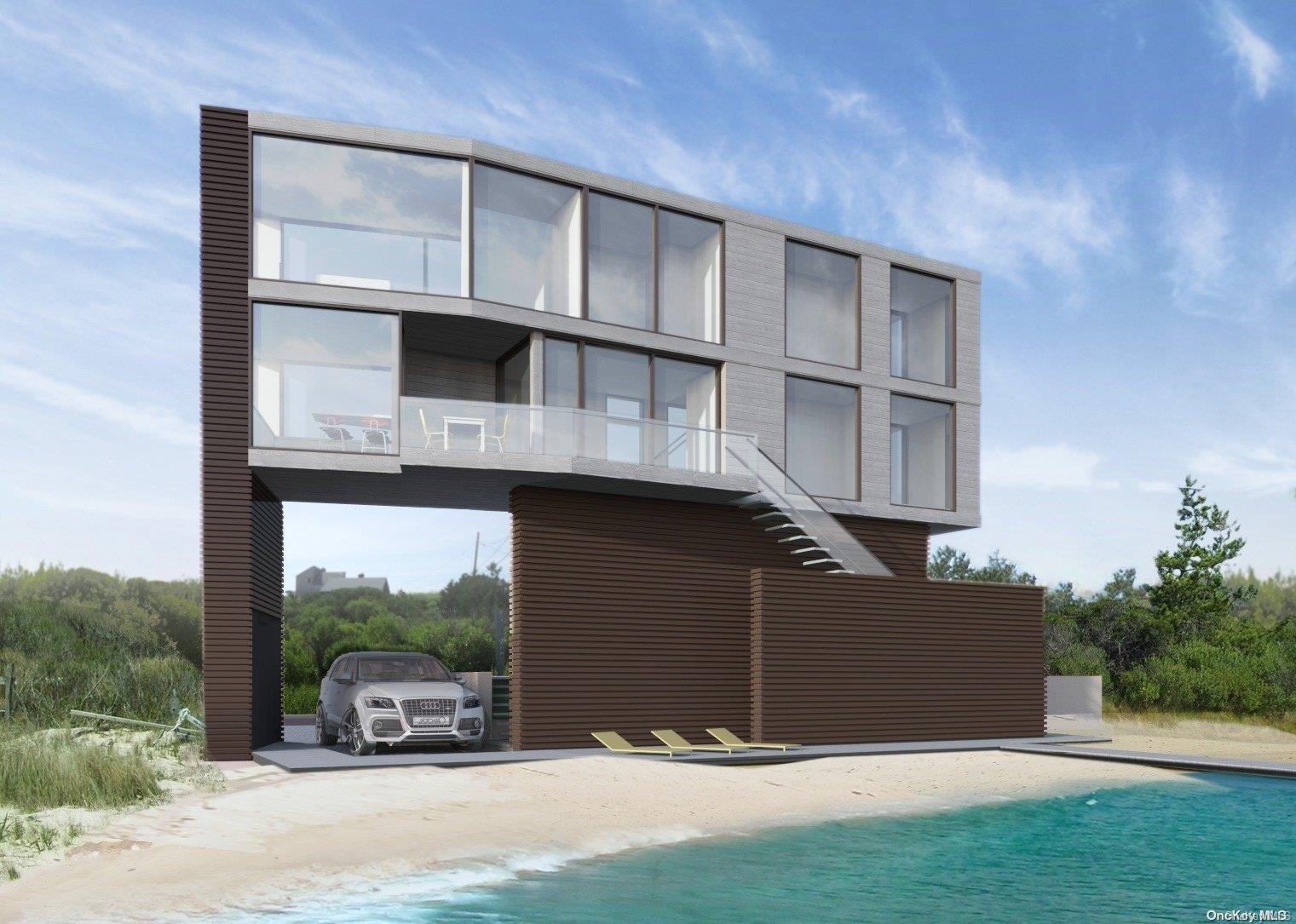 53 Dune Road Hampton Bays, NY 11959 - Photo 3 of 20 a front view of a house with a garden