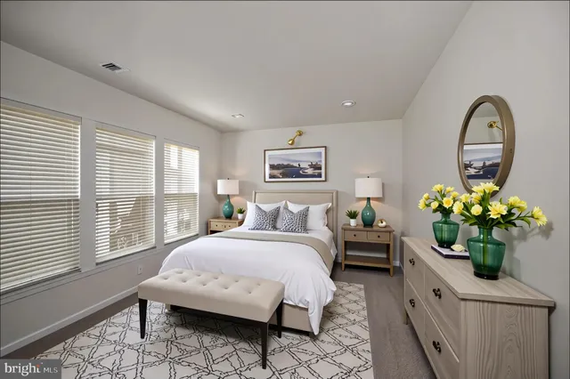 a bathroom with a toilet a sink and bathtub