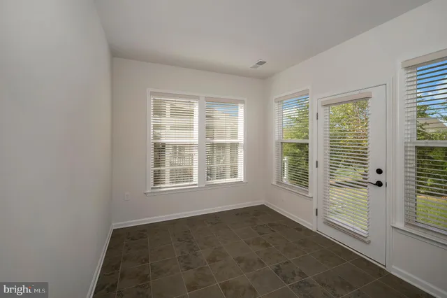 a view of a room with an empty room