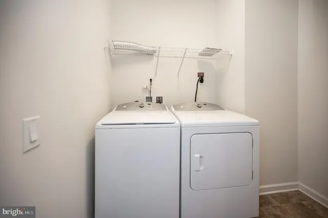 a view of house with backyard