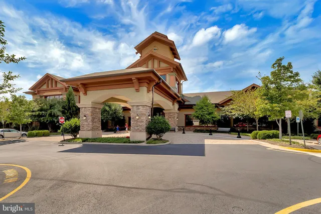 a view of a water pond with green space