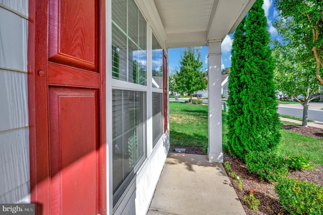 a view of a house with a small porch
