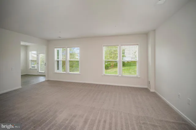 a view of a kitchen with granite countertop a large counter top