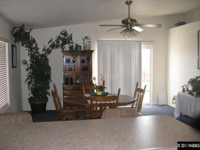 17780 Fairfax Court Reno, NV 89508 - Photo 3 of 13 a view of a livingroom with furniture and a window