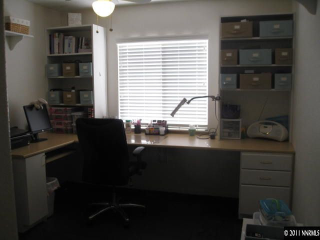 17780 Fairfax Court Reno, NV 89508 - Photo 7 of 13 a view of a workspace with a window
