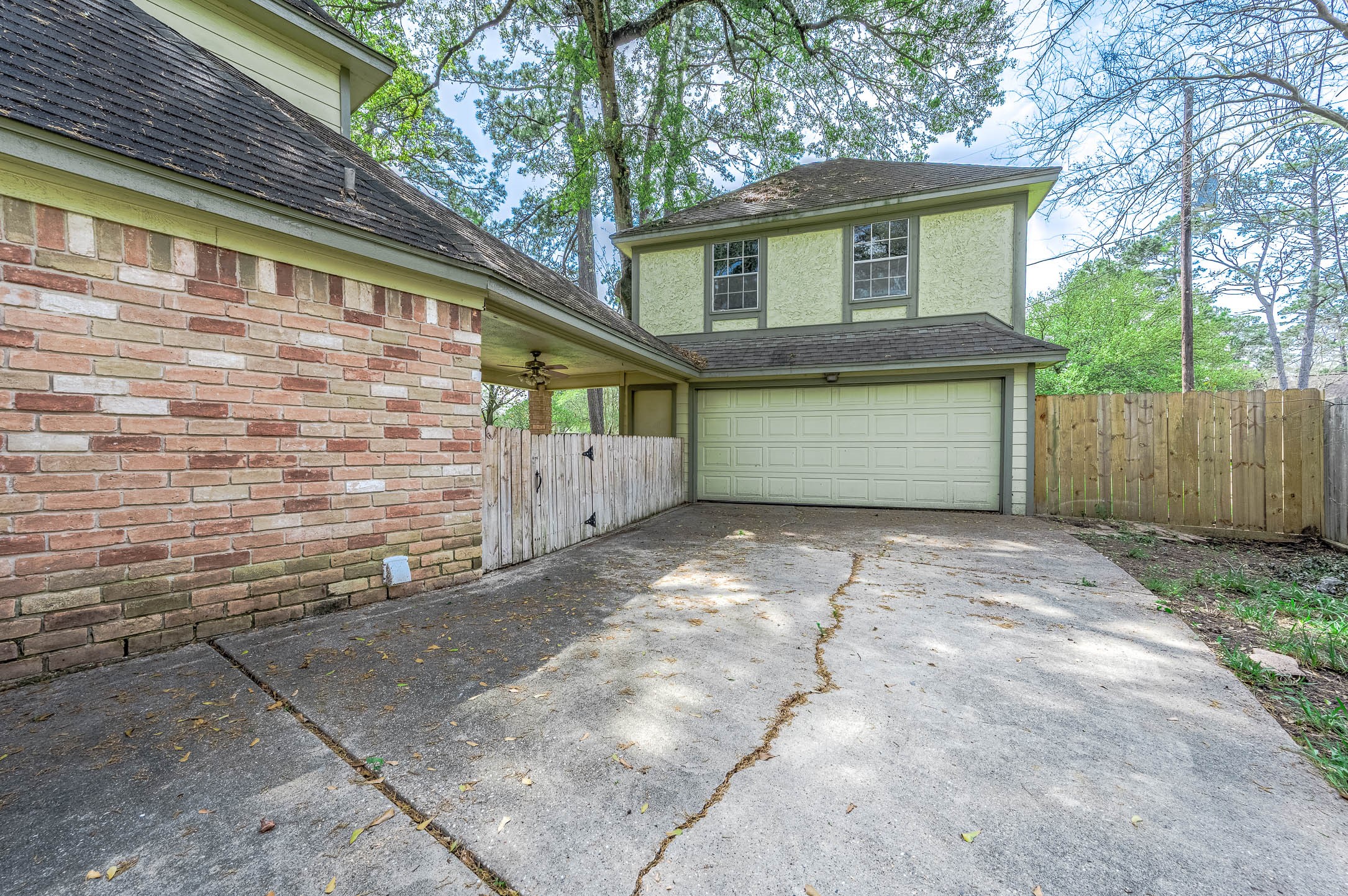 17627 Terrawren Lane Spring, TX 77379 - Photo 28 of 30 a front view of a house with a yard and garage