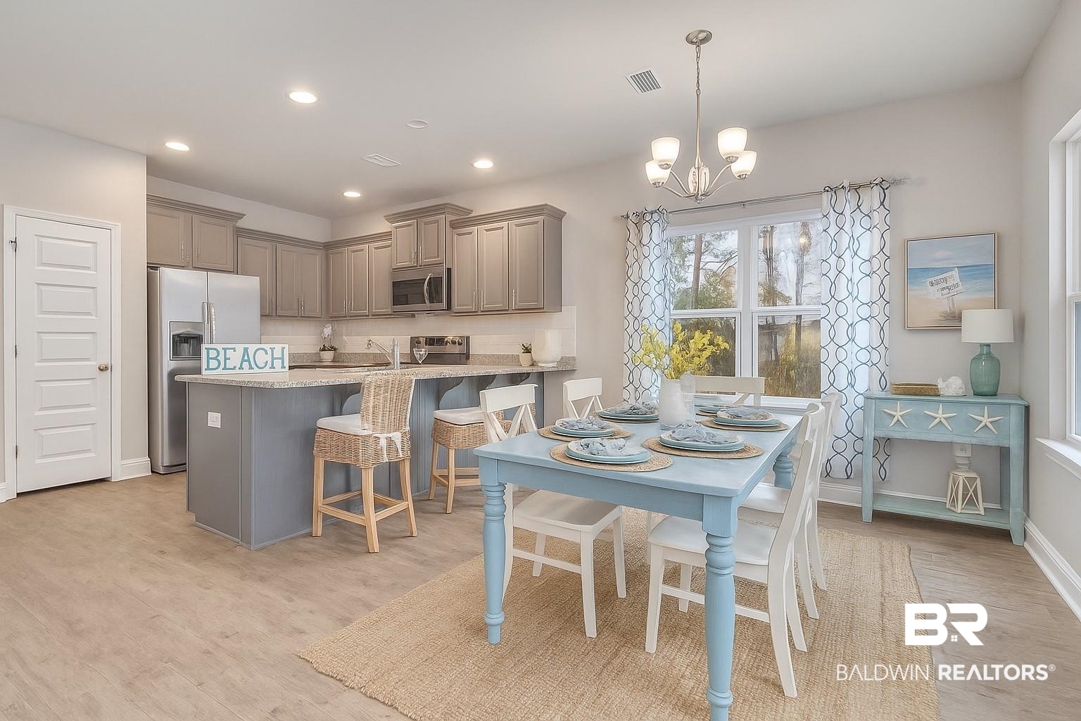 Example of Staged Dining Area - home is sold unfurnished.