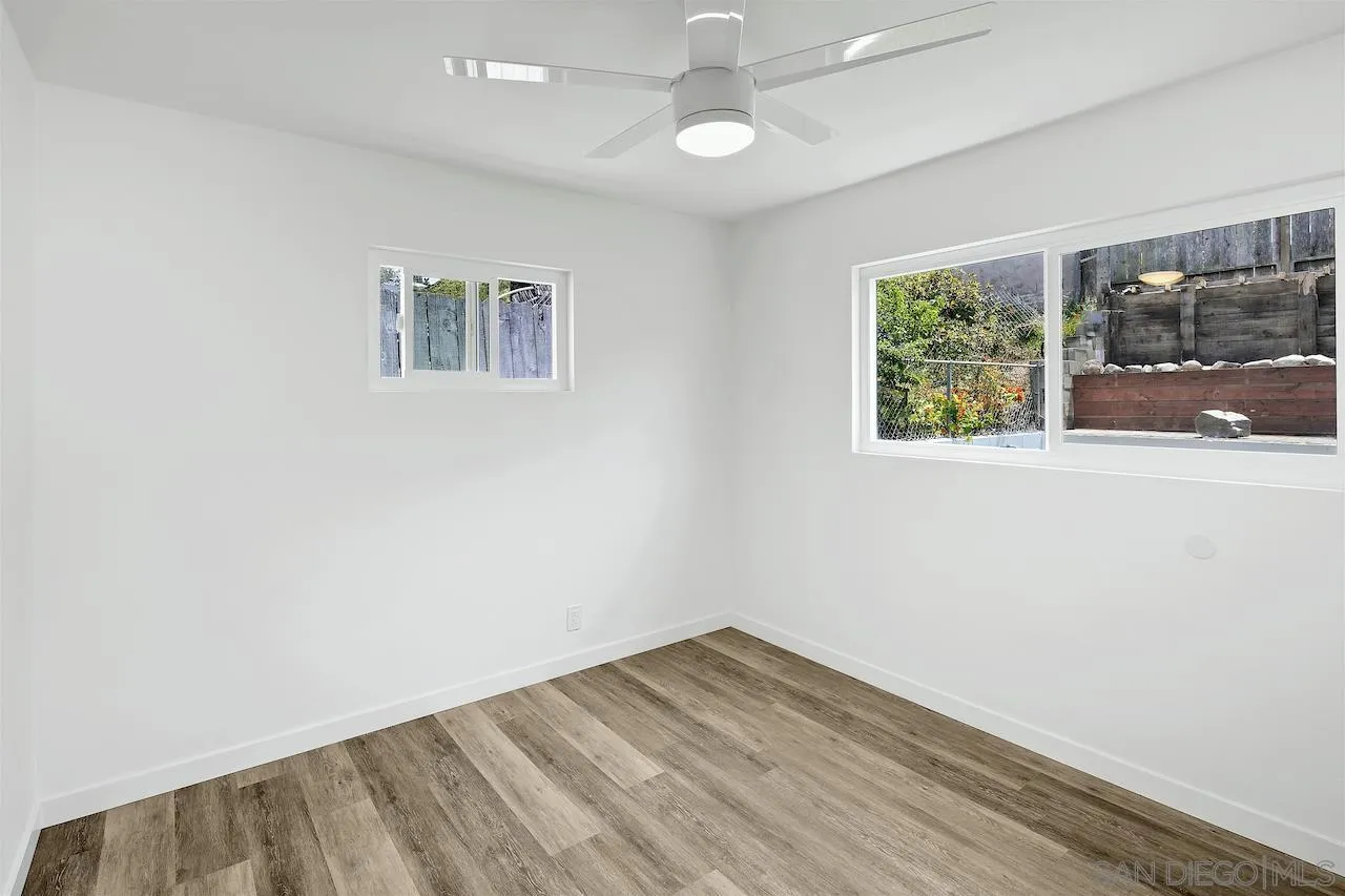 725 Cathy Lane Encinitas, CA 92007 - Photo 12 of 31 an empty room with a window