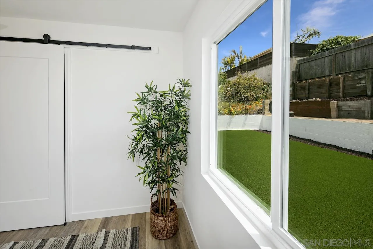 725 Cathy Lane Encinitas, CA 92007 - Photo 14 of 31 a view of a room with a potted plant