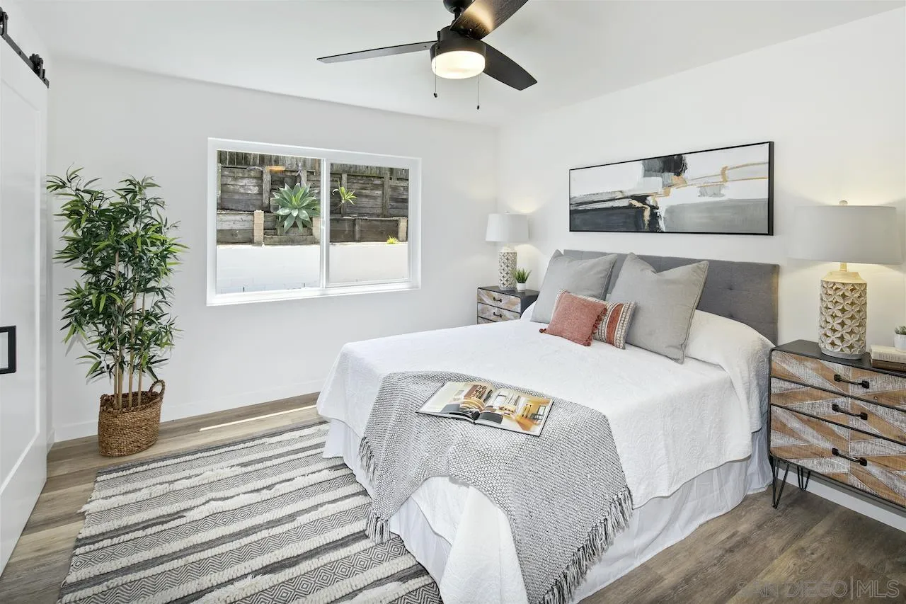 725 Cathy Lane Encinitas, CA 92007 - Photo 15 of 31 a bedroom with bed and window