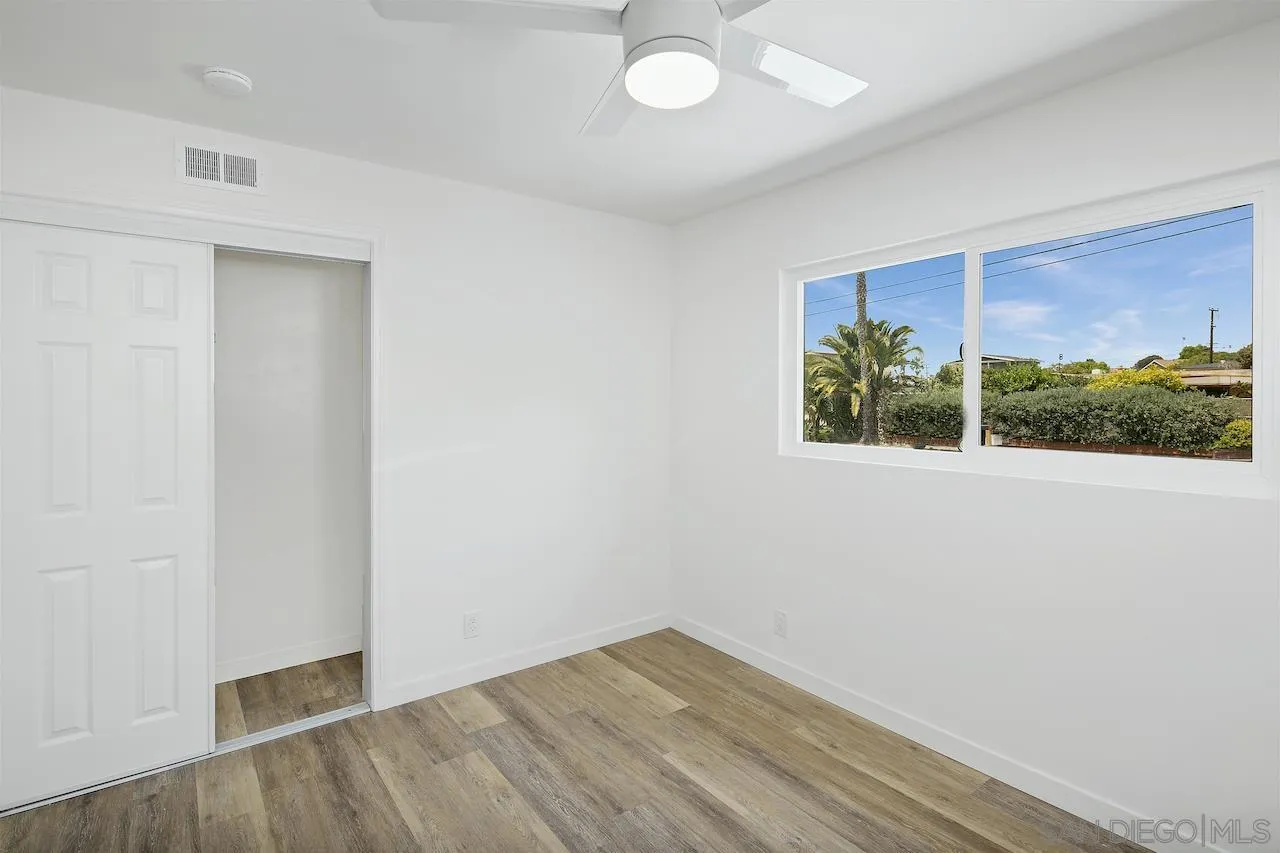 725 Cathy Lane Encinitas, CA 92007 - Photo 19 of 31 an empty room with a window