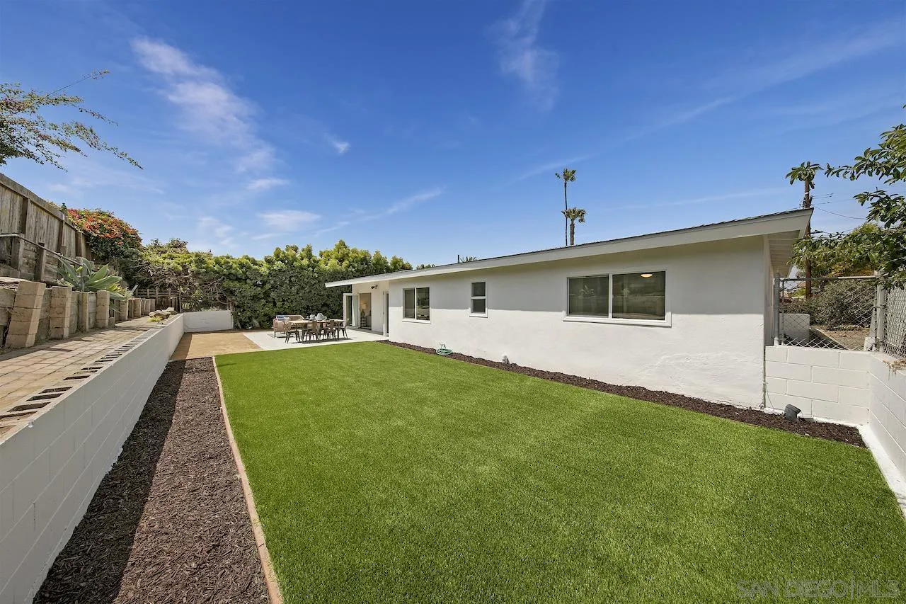 725 Cathy Lane Encinitas, CA 92007 - Photo 22 of 31 a front view of a house with a yard