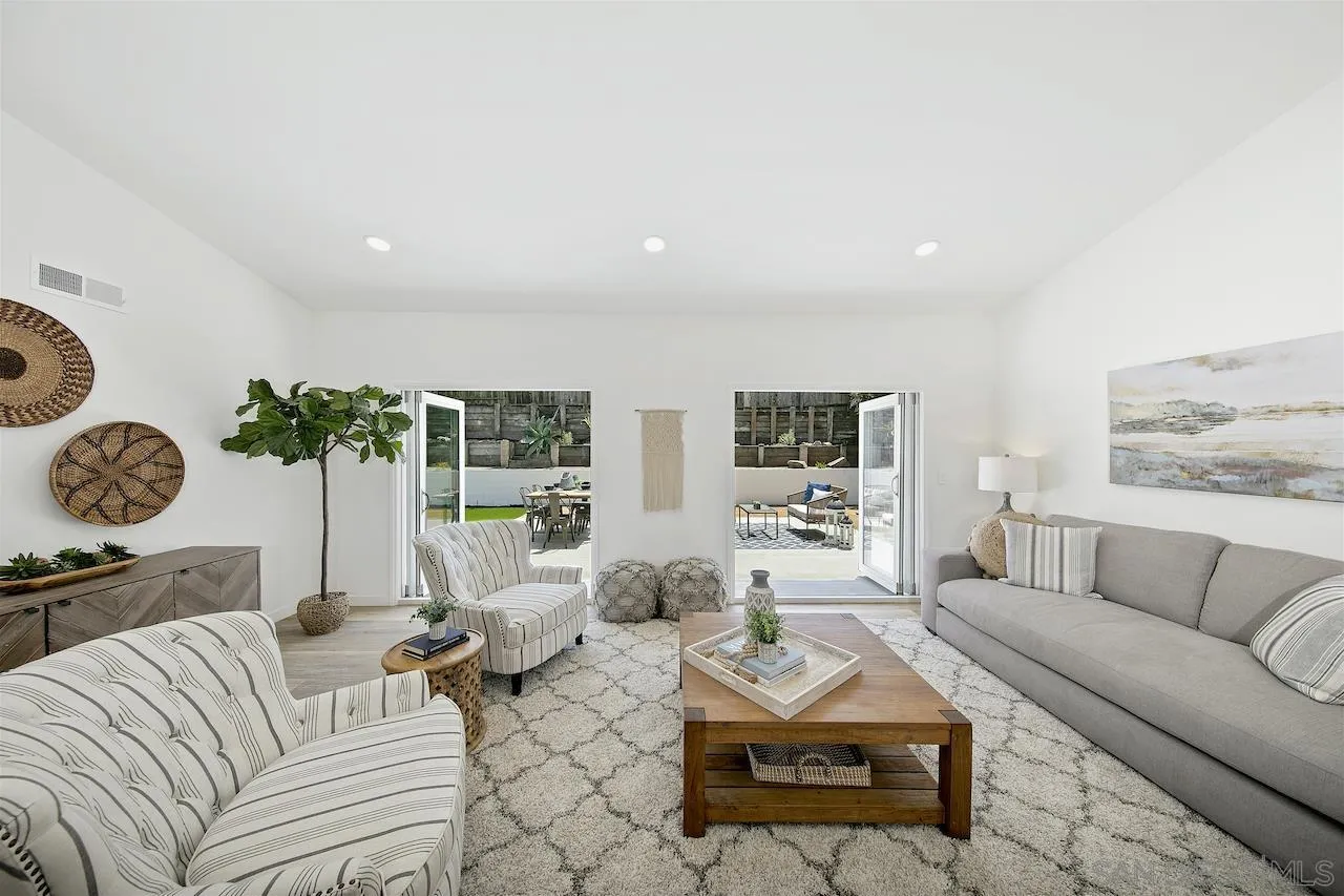 725 Cathy Lane Encinitas, CA 92007 - Photo 8 of 31 a living room with furniture and a large window