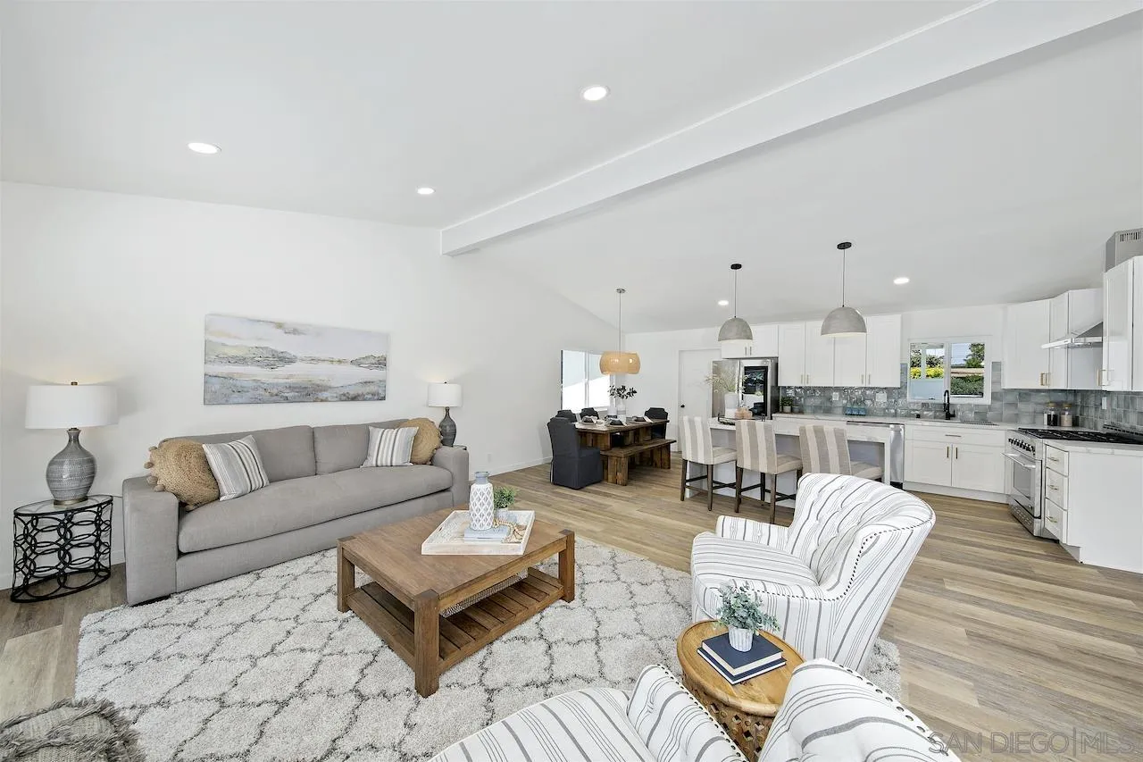 725 Cathy Lane Encinitas, CA 92007 - Photo 9 of 31 a living room with furniture kitchen and a table