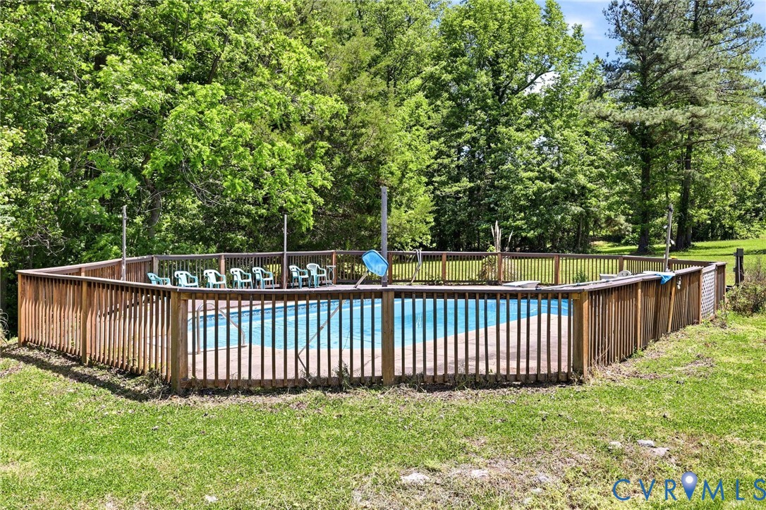 3355 Duke Road Powhatan, VA 23139 - Photo 9 of 67 a view of a backyard with a fence