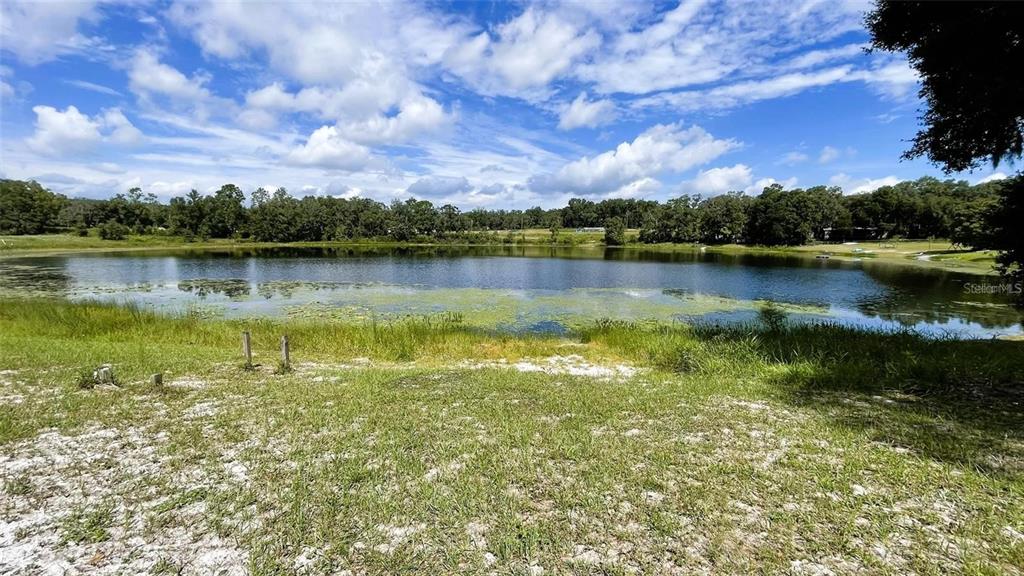 151 Twin Lakes Road Hawthorne, FL 32640 - Photo 27 of 28 a view of a lake with a city