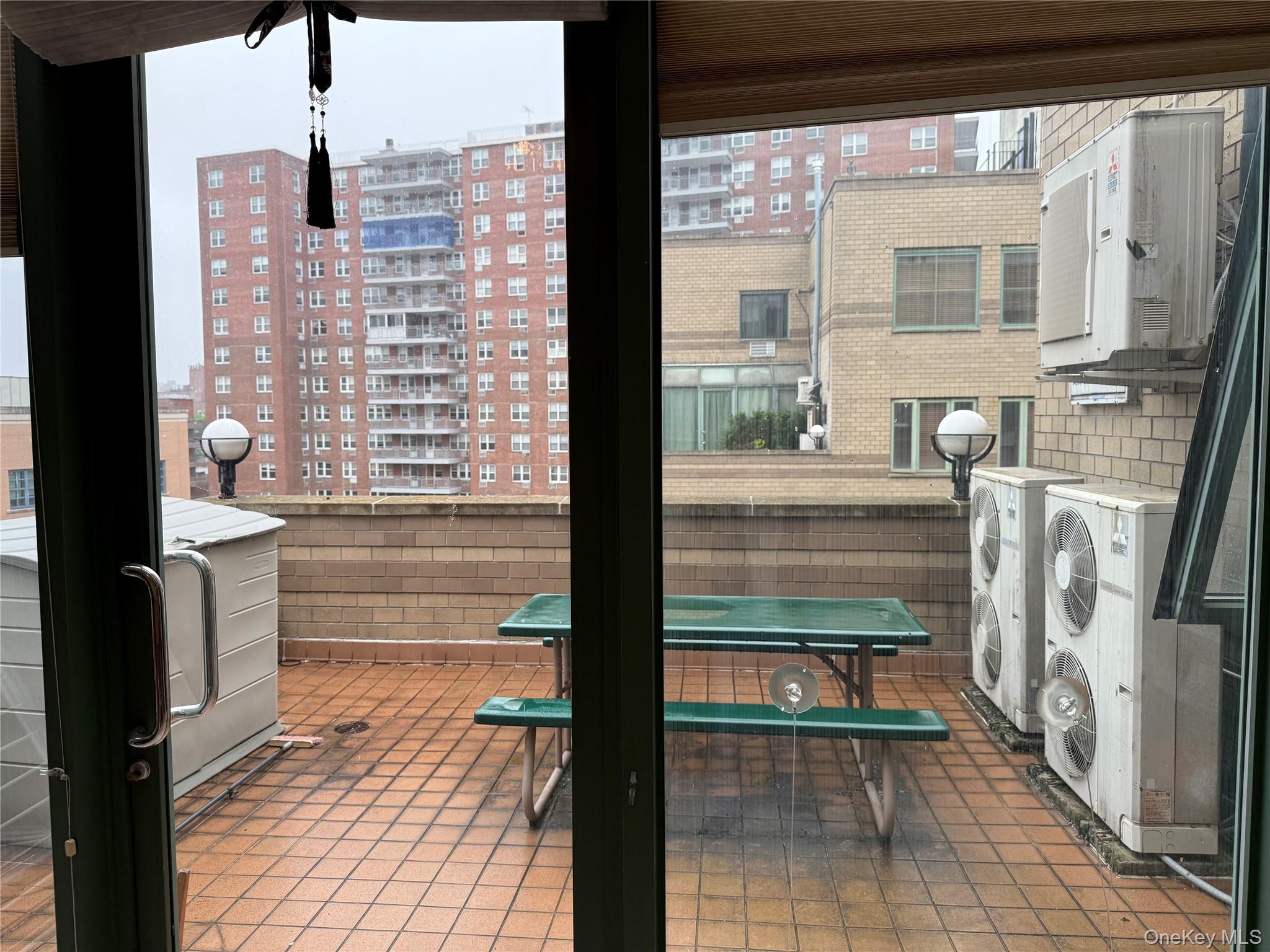 42-31 Colden Street, Unit F7A Queens, NY 11355 - Photo 10 of 18 a bathroom with a toilet a sink and a shower