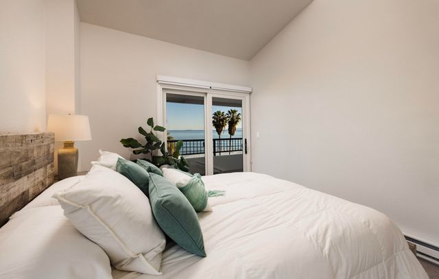 a view of a chairs and table in patio