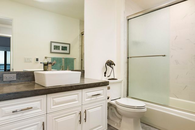 a view of a city with tall buildings