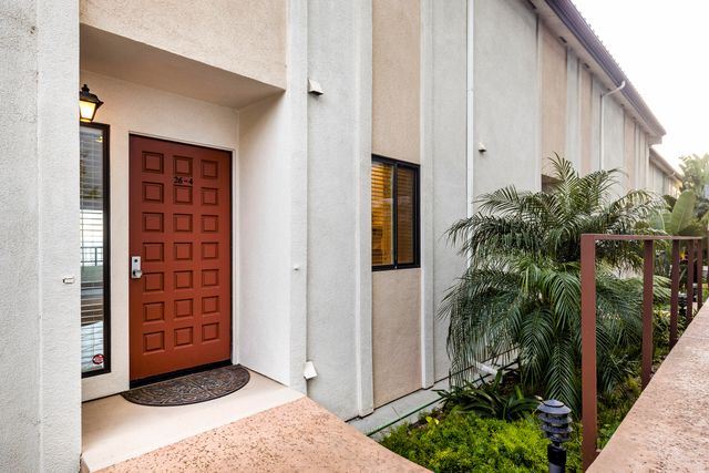 a kitchen with a stove and a microwave