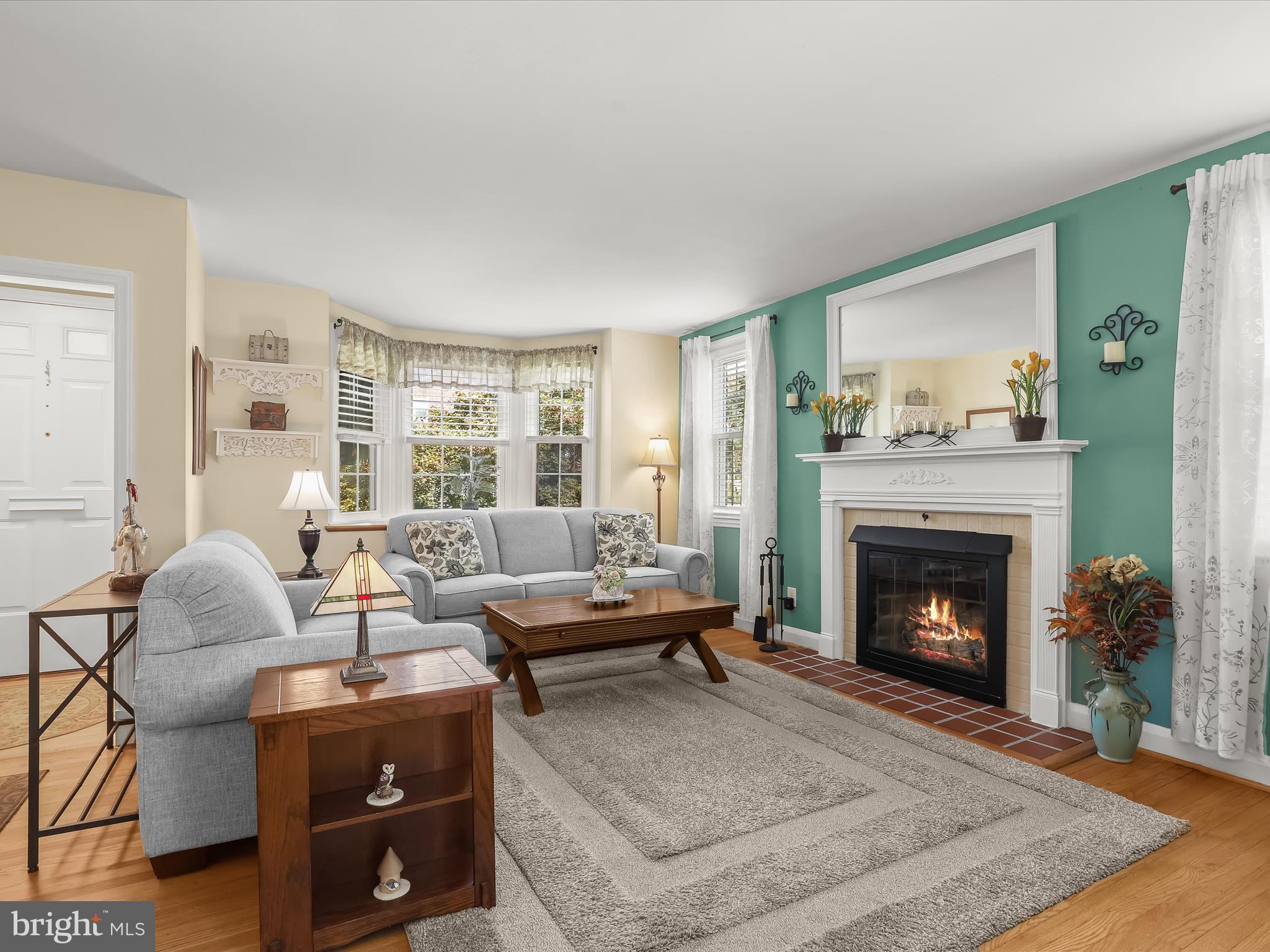 411 Greenlow Road Baltimore, MD 21228 - Photo 3 of 59 Living Room - Fireplace - Hardwood Floors
